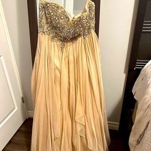 Jovani Gown with corset back to allow more personal sizing.